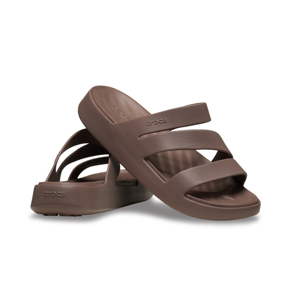 Pair of Getaway Crocs tan womens sandals