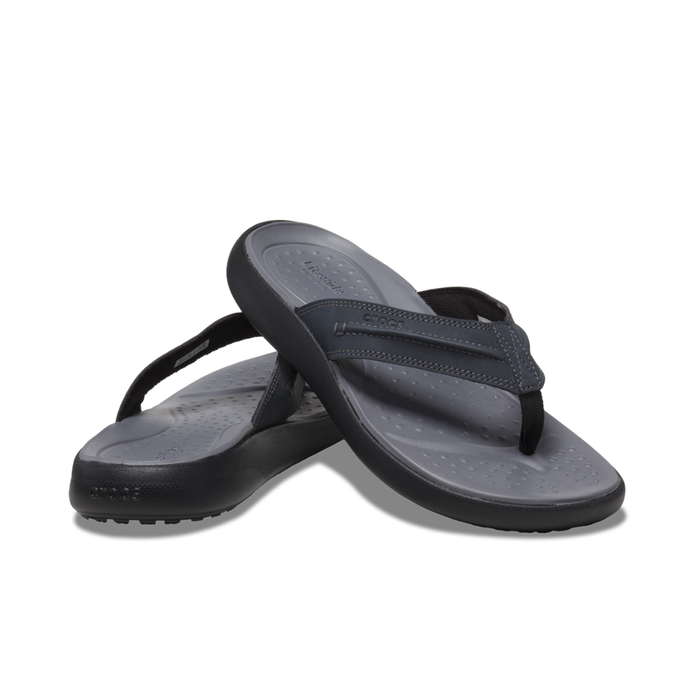 Pair of mens Crocs faux leather flips