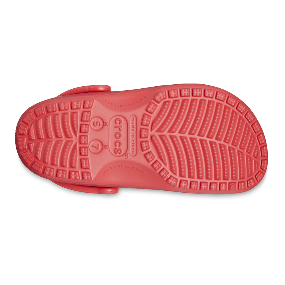 Non-slip sole of Crocs classic red clogs for men and women.