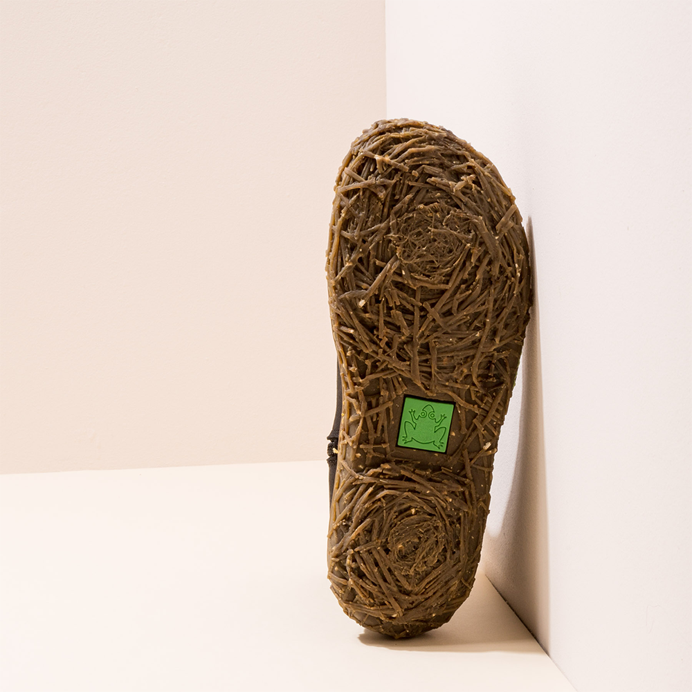 Nido El Naturalista sole from women's ankle boots. Green sustainability frog logo showing