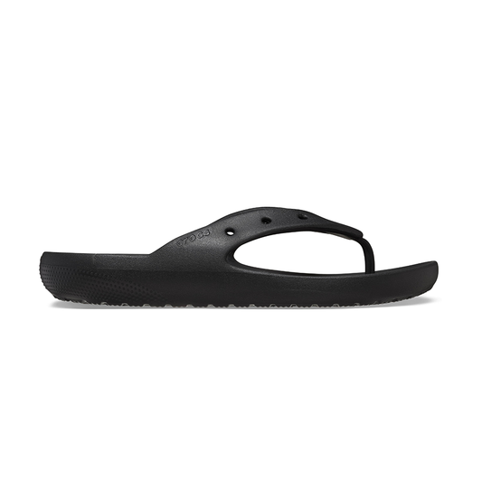 Single black Crocs Classic flio-flop with Jibbitz holes side on view