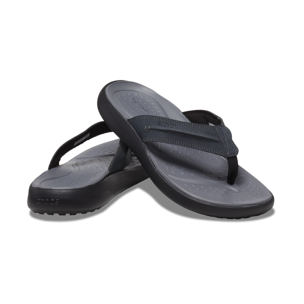 Pair of grey and black mens Crocs flip-flops