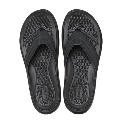 Pair of Crocs Yukon flips in black 