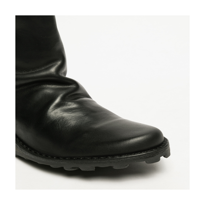Rounded black toe view of Fly London boot